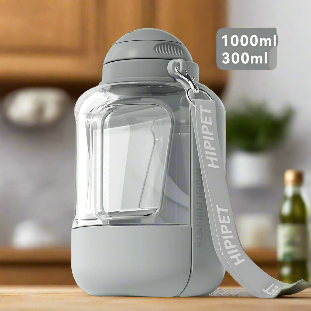 2-in-1 Reise Trink- & Futterflasche (1000ml Wasser / 300ml Futter) – für Hunde & Katzen